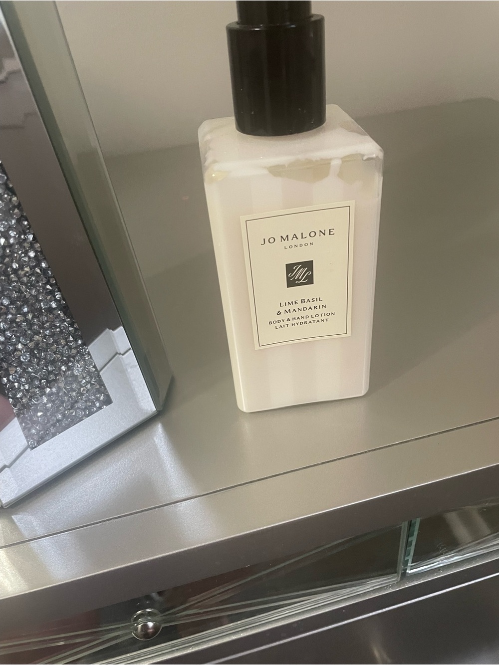 Jo Malone Cream Lotion Bottle with Black Pump. You will smell amazing!!!!